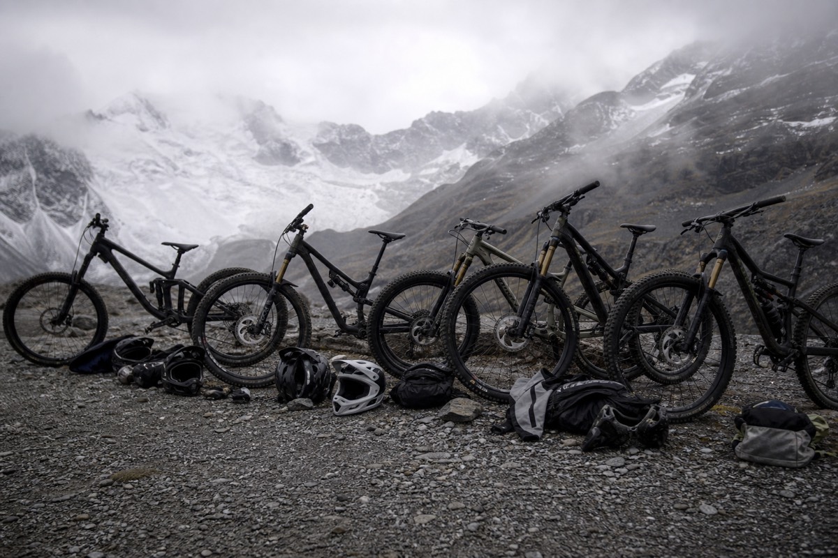 Guides checking bikes and helmets before a Death Road bike tour from La Paz