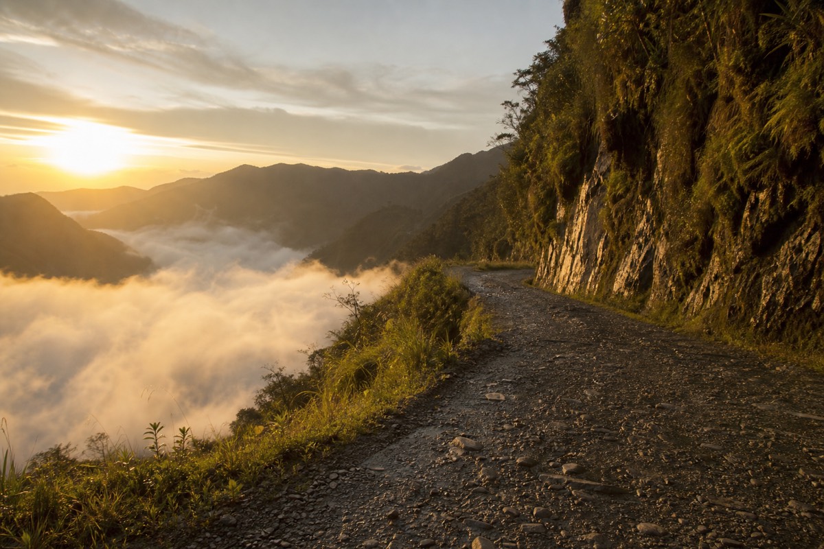 Morning light on Bolivia's Death Road, a popular ride tied to La Paz Bolivia travel safety